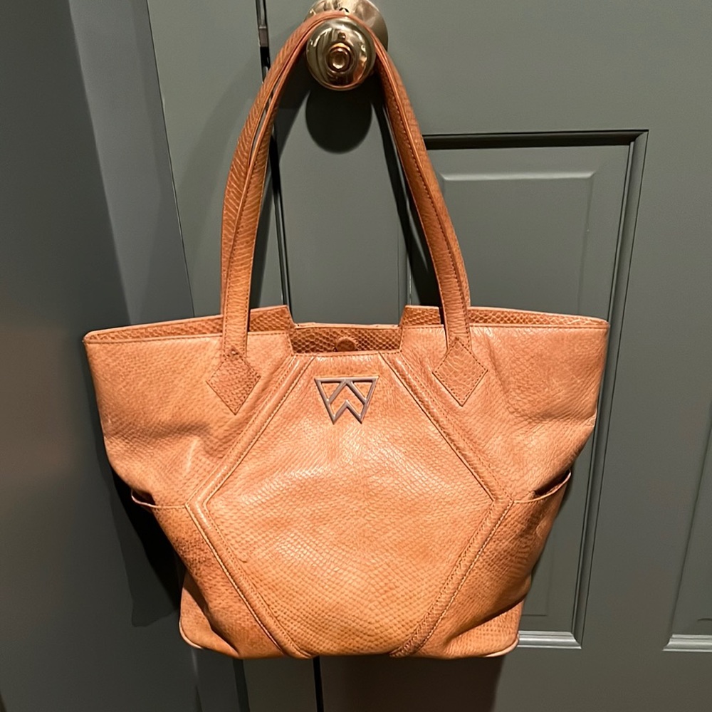 Kelly Wynne animal print leather tote